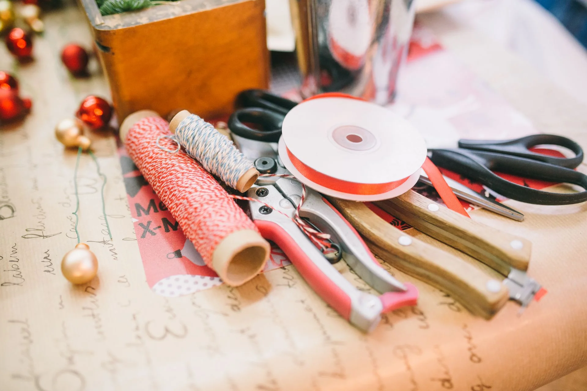 vintage christmas decor ideas 2026 — flat lay of ornament-making supplies for handmade ornaments