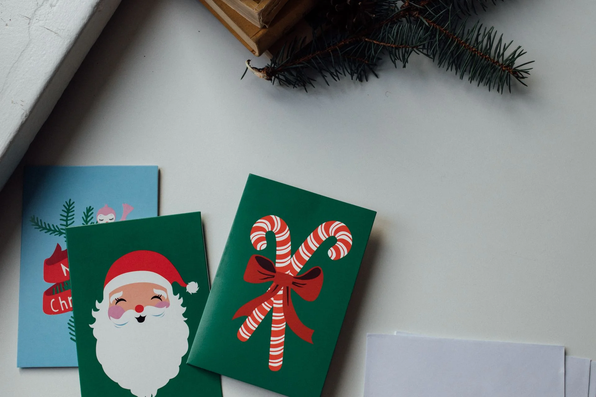 vintage christmas decor ideas 2026 — vintage christmas postcards flat lay